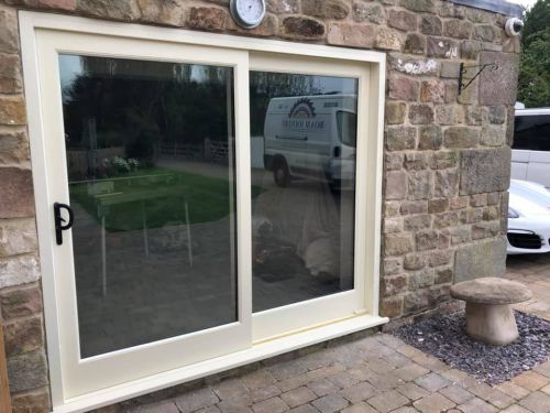 Click Here To Enlarge This Photo Of Front, Patio and Windows
