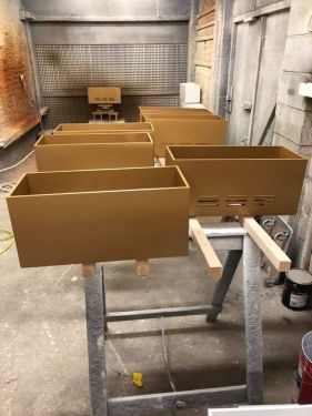 Click Here To Enlarge This Photo Of Thirty Gold PlayStation Housing Boxes
