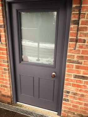 Click Here To Enlarge This Photo Of Front Door and Shaker Cupboards