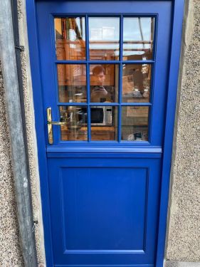 Click Here To Enlarge This Photo Of Couple of Red Grandis Doors