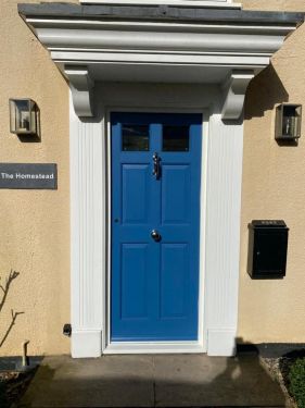 Click Here To Enlarge This Photo Of Couple of Red Hardwood Doors