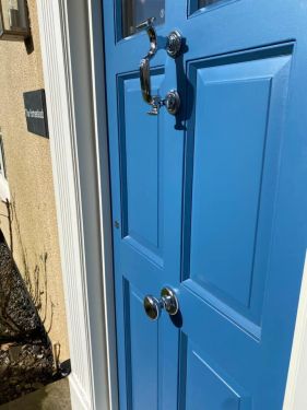 Click Here To Enlarge This Photo Of Couple of Red Hardwood Doors