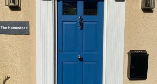 Couple of Red Hardwood Doors